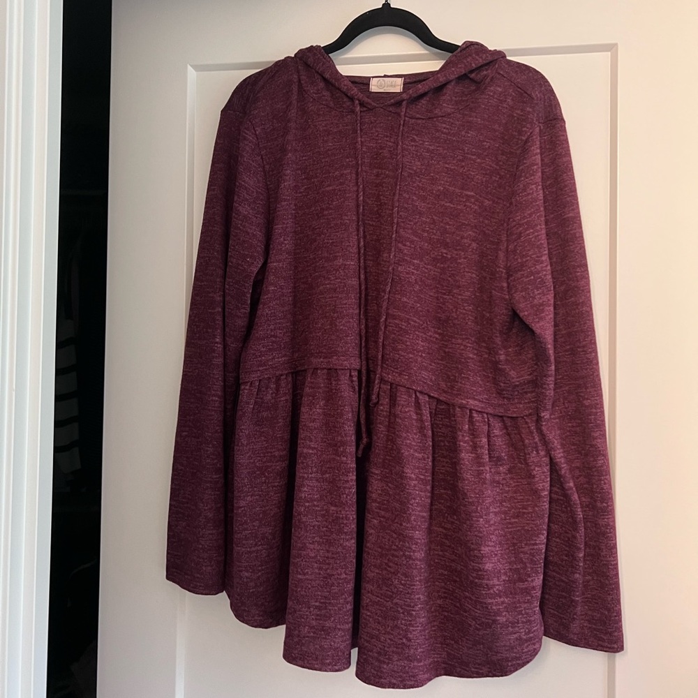 Cute burgundy long sleeved babydoll top.